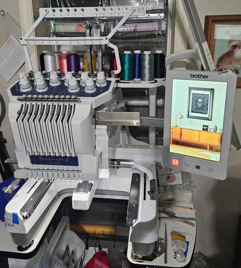 Brother Entrepreneur Pro X 10-needle embroidery machine with thread spools